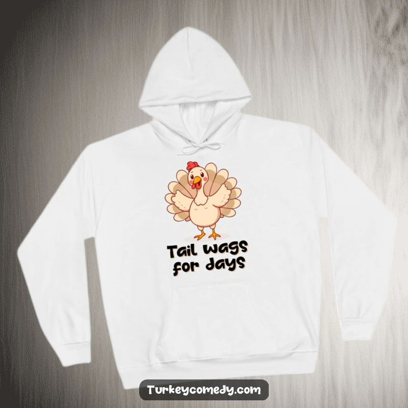 Funny hoodie featuring a happy turkey character doing a silly, wobbly dance, tail feathers fanned out, demonstrating pure, unadulterated joy.