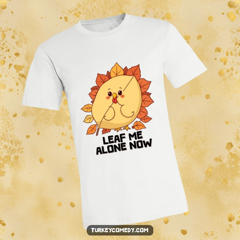 Funny t-shirt with a curious turkey character peeking playfully from behind a giant, festive autumn leaf, evoking a sense of wonder.
